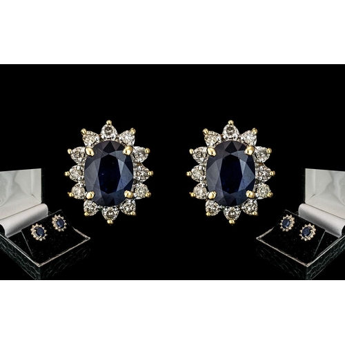 40B - A Fine Pair of 18ct Gold Diamond and Sapphire Set Earrings. Marked 18ct to Post. Diamonds and Sapphi... 