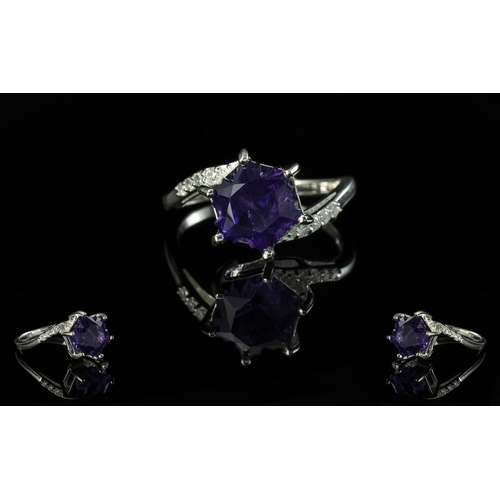 195 - Amethyst Star Cut Ring, an unusual cut of amethyst in the form of a softened star shape, weighing 3.... 