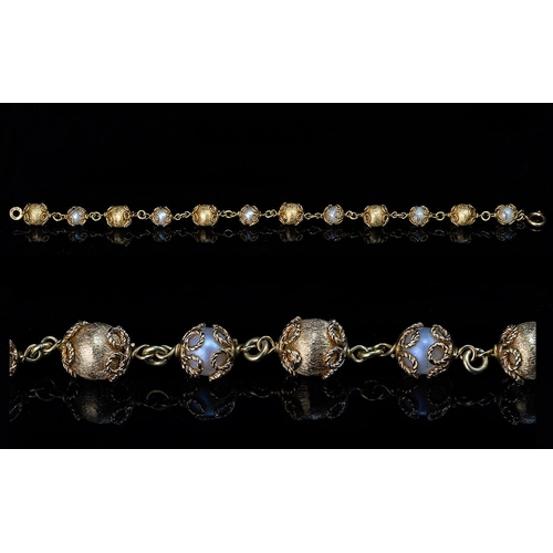 212 - 18ct Gold and Pearl Set Bracelet, Marked 18ct - 750, Ornate Well Crafted Bracelet, ' Bauble ' Design... 