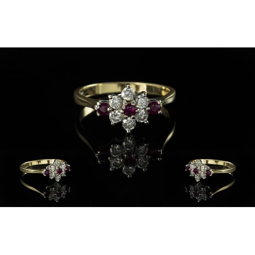 234 - Ladies 18ct Gold Attractive / Exquisite Rubies and Diamond Cluster Ring. Flower head Design. Full Ha... 