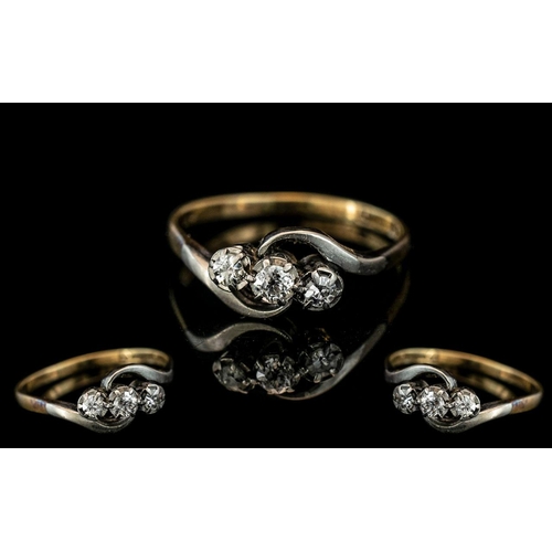 287A - 9ct and Platinum 3 Stone Diamond Ring, marked 9ct and platinum to interior of shank.  The diamond of... 