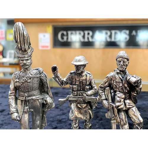 315 - Three Silvered Metal Military Figures, well sculpted and finished, each approx. 4 inches (10cms) hig... 