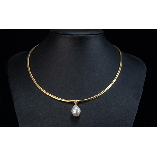 62A - 18ct Gold Snake Chain Necklace, set with a Baroque freshwater pearl drop.  Gross weight 25 grams.