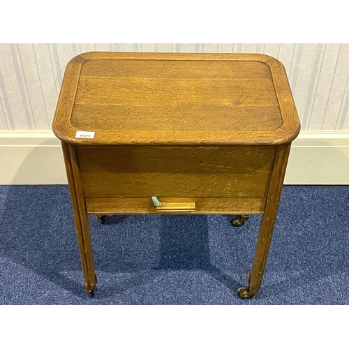 1021 - Mid-Century Oak Sewing Box, with hinged top, silk lined interior above a single drawer, raised on sq... 