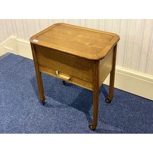 1021 - Mid-Century Oak Sewing Box, with hinged top, silk lined interior above a single drawer, raised on sq... 