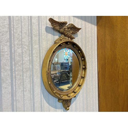 1026 - Gilt Empire Style Wall Mirror, eagle crest to top, measures 27'' high x 18'' wide.