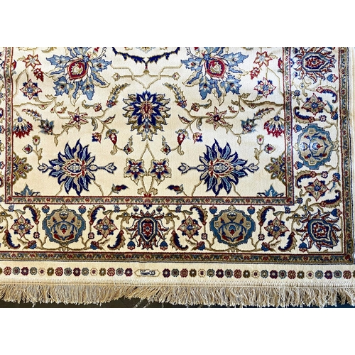 1047 - Ivory Ground Full Pile Kashmir Rug, all over floral design, measures 170 x 120 cm.