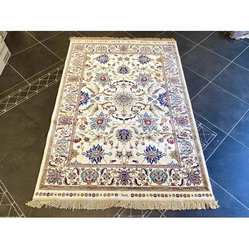 1047 - Ivory Ground Full Pile Kashmir Rug, all over floral design, measures 170 x 120 cm.