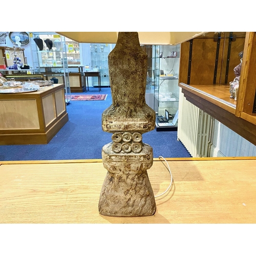 1063 - Heavy Stone Based Aztec Style Lamp, with cream shade.  Lamp base approx. 22'', overall height 30''.