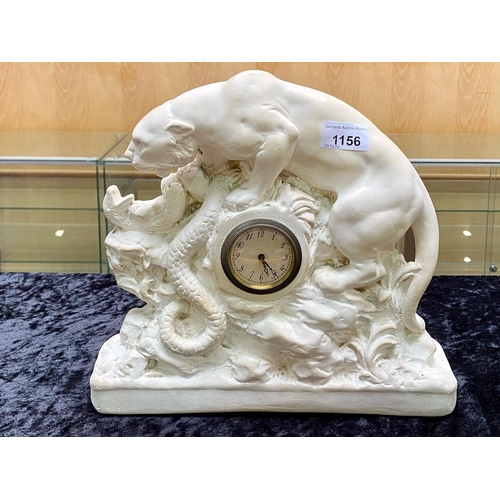 1156 - A Panther and Snake Alabaster Base with a Central Clock (1920's) number RD803644 marked OP267.