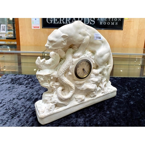 1156 - A Panther and Snake Alabaster Base with a Central Clock (1920's) number RD803644 marked OP267.