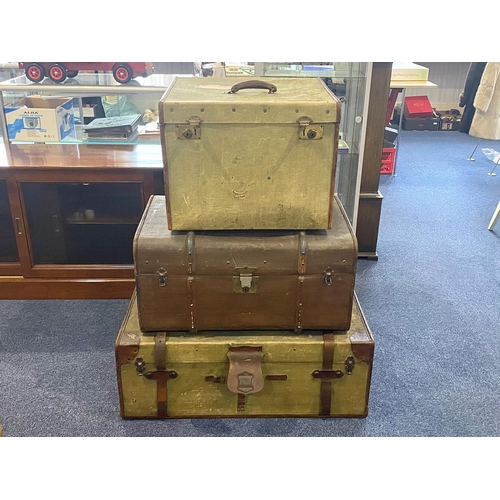 1180 - Three Vintage Large Travelling Trunks, comprising:  1.  Selfridges large travelling trunk, label to ... 