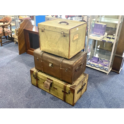 1180 - Three Vintage Large Travelling Trunks, comprising:  1.  Selfridges large travelling trunk, label to ... 