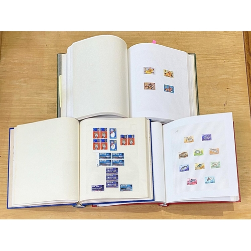 1400 - Stamp interest: Three springback stamp albums featuring GB and Oceana stamps.