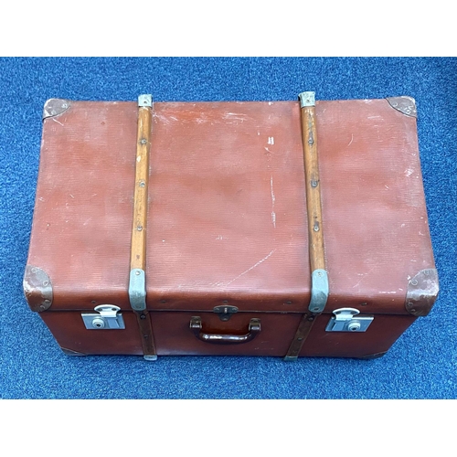 1452 - Large Vintage Suitcase, brown with strapping and studs.  Measures 17'' wide x 28'' long x 11'' high.