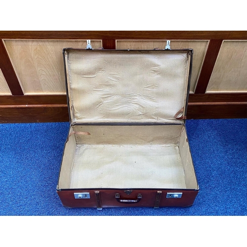 1452 - Large Vintage Suitcase, brown with strapping and studs.  Measures 17'' wide x 28'' long x 11'' high.