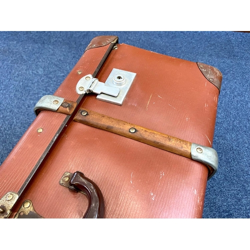 1452 - Large Vintage Suitcase, brown with strapping and studs.  Measures 17'' wide x 28'' long x 11'' high.