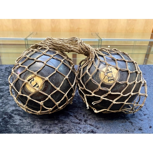 1466 - Pair of Vintage Heavy Wooden Crown Green Bowling Balls, in a string carrier.