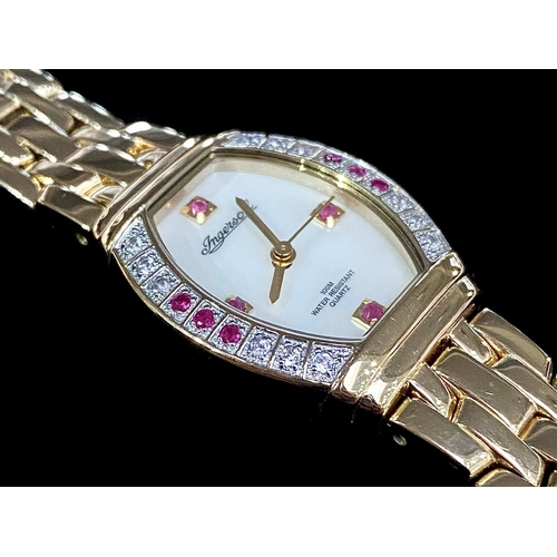 184 - Ingersoll Ladies Gold on Steel Set with Rubies & Diamonds, Quartz Wrist Watch, features a white pear... 