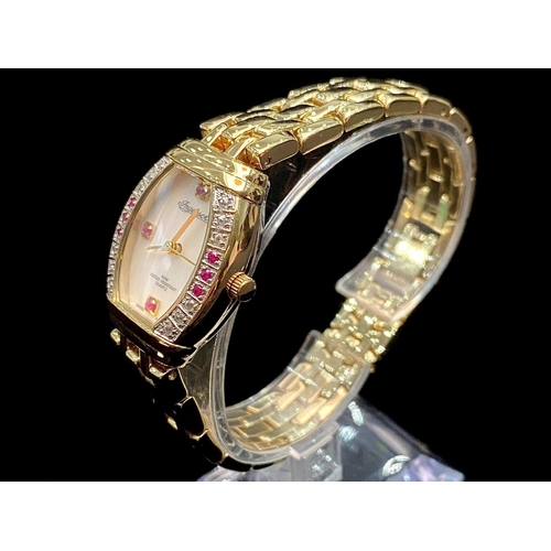 184 - Ingersoll Ladies Gold on Steel Set with Rubies & Diamonds, Quartz Wrist Watch, features a white pear... 