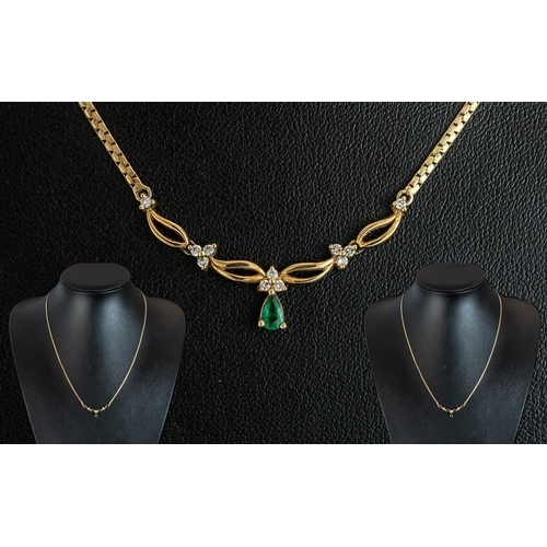 409A - 9ct Gold Necklace, set with an Emerald & Diamond drop.