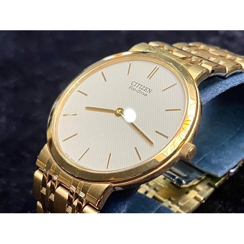 433 - Citizen Eco Drive Gentleman's Wrist Watch, bracelet strap, champagne face with gold batons, in fitte... 