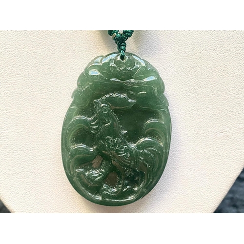 442 - Green Jade Chinese Zodiac Pendant Necklace, the pendant carved with the image of the Chinese Zodiac ... 