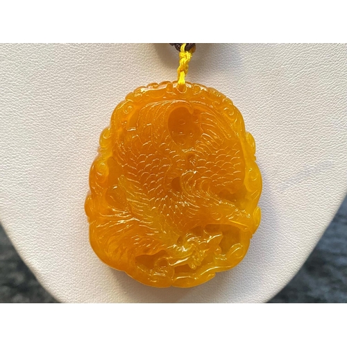 445 - Honey Colour Jade Carved Pendant on Yellow Jade Necklace plus matching necklace; the pendant carved ... 