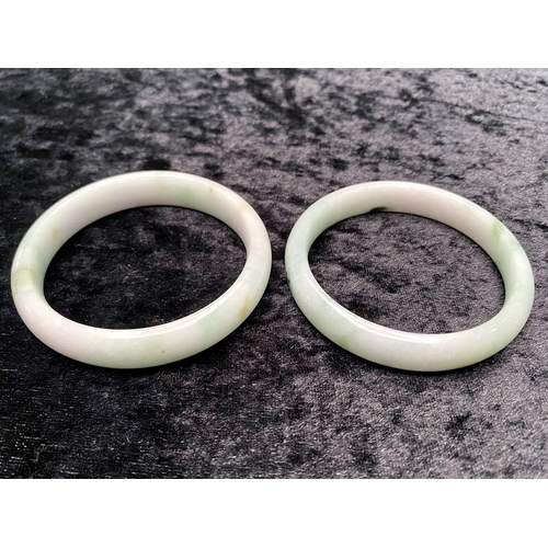 452 - Pair of White Jade Bangles, carved from solid jade