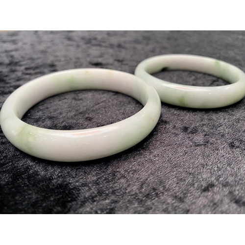 452 - Pair of White Jade Bangles, carved from solid jade