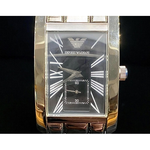 464 - Emporio Armani Chrome Bracelet Watch, black face, Roman numerals.  In original box with booklet.