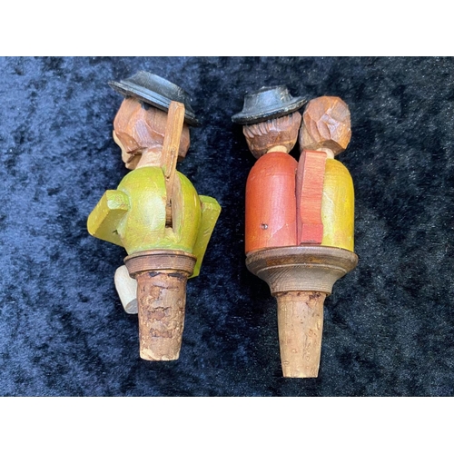 472A - Two Antique Novelty Carved Wooden Figural Bottle Stoppers with lever operated moveable parts, one be... 