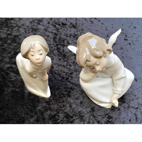 599 - Two Lladro Figures, comprising Lladro 4961 'Angel Dreaming', measures approx 6.5'' tall, slight clip... 