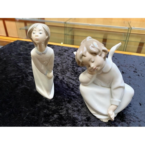 599 - Two Lladro Figures, comprising Lladro 4961 'Angel Dreaming', measures approx 6.5'' tall, slight clip... 