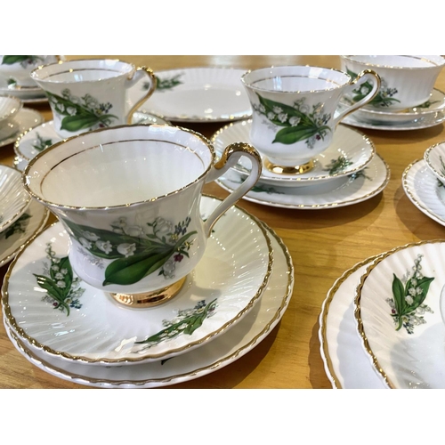 615 - Lubern bone china 31 piece tea set with a Lily of the Valley design. Pieces included in this matchin... 