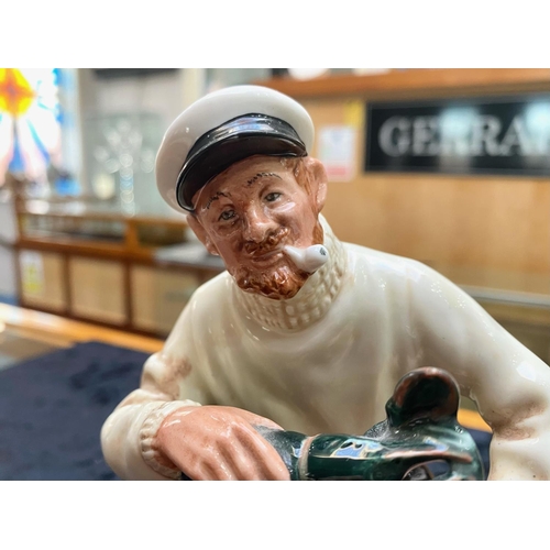 641 - Royal Doulton HN2323 'The Lobster Man', depicting a man sitting on a rock with a lobster basket and ... 