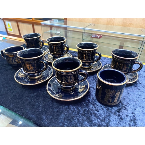 646 - Greek Coffee Set, hand made, black with gilt Grecian figures, comprising six mugs, six saucers, a mi... 