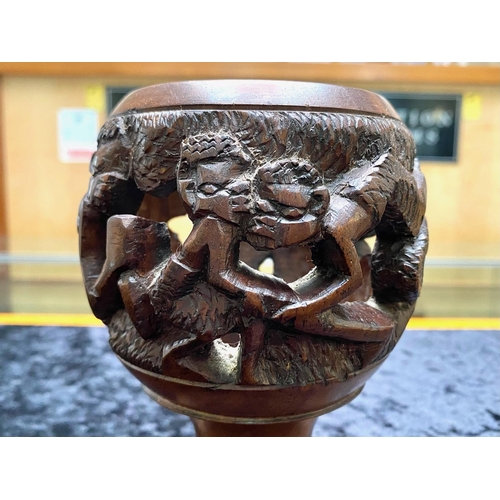 866 - North African Carved Goblet continuous figural scene depicting natives. Height 6 inches