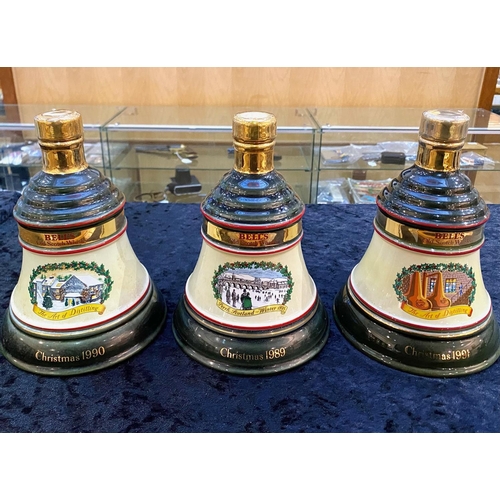 1467 - Three Bells Whisky Christmas Decanters with Contents, dated 1989, 1990 and 1991.  In original tin co... 