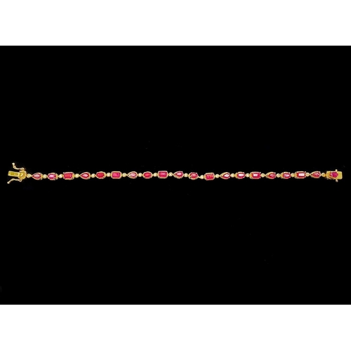 251 - Multi- Cut Ruby Line Bracelet, the row of rubies, unusually, comprising an octagon, an oval, a round... 