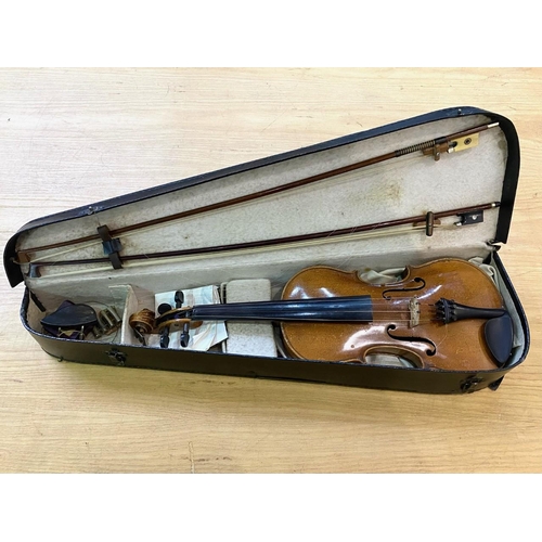 1106 - Two Violins in Cases, one in black case with accessories, the other in a wood effect case lined in r... 