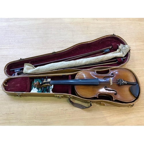 1106 - Two Violins in Cases, one in black case with accessories, the other in a wood effect case lined in r... 