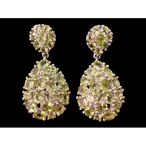 190 - Peridot Cluster Drop Earrings, the brilliant, sparkling green of peridot, totalling 7.5cts, comprisi... 