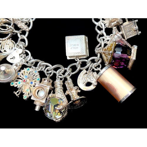 257 - Chunky Silver Charm Bracelet, Loaded with Different Charms, Which Includes Telephone, lamp, shoe, Ho... 