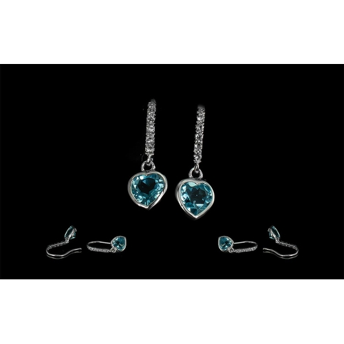 282 - Sky Blue Topaz and White Topaz Drop Earrings, single heart cut blue topaz, bezel set and suspended f... 