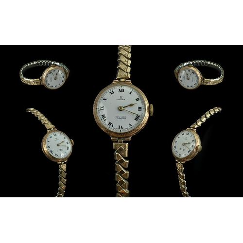 307 - Omega Ladies 1950's 9ct Gold Cased Mechanical Wrist Watch, with white porcelain dial, black Roman nu... 