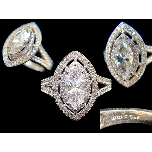 345 - Six Ladies Silver Rings, comprising a crystal set oval ring, a diamond shaped Marcasite ring with a ... 