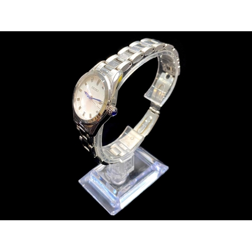 346 - Ladies Seiko Bracelet Watch, silver tone bracelet, white dial with silver batons, date aperture.  In... 