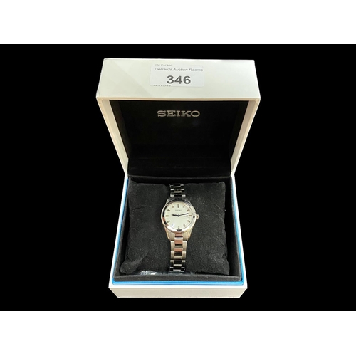 346 - Ladies Seiko Bracelet Watch, silver tone bracelet, white dial with silver batons, date aperture.  In... 