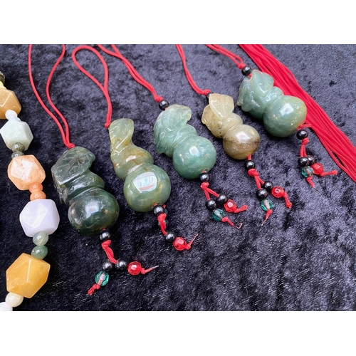 382 - Box of  Jade Items, including two bangles, two jade bead necklaces, one with a jade elephant figure,... 